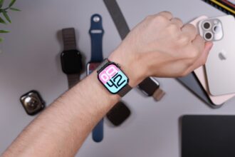 Person wearing smartwatch with iphones and bands