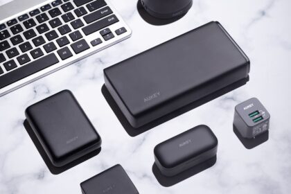 black android smartphone beside black smartphone