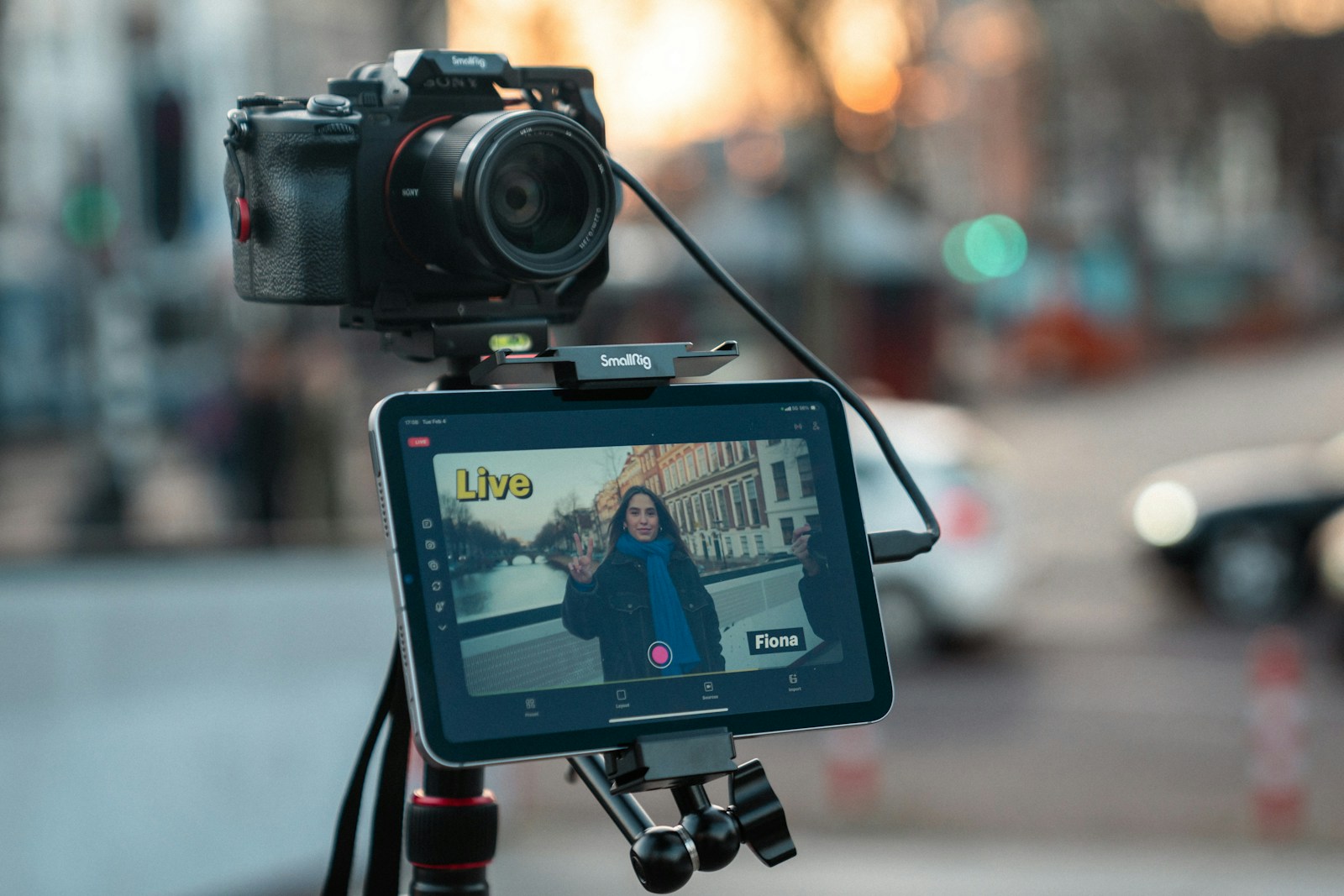 Camera and tablet recording a person on street