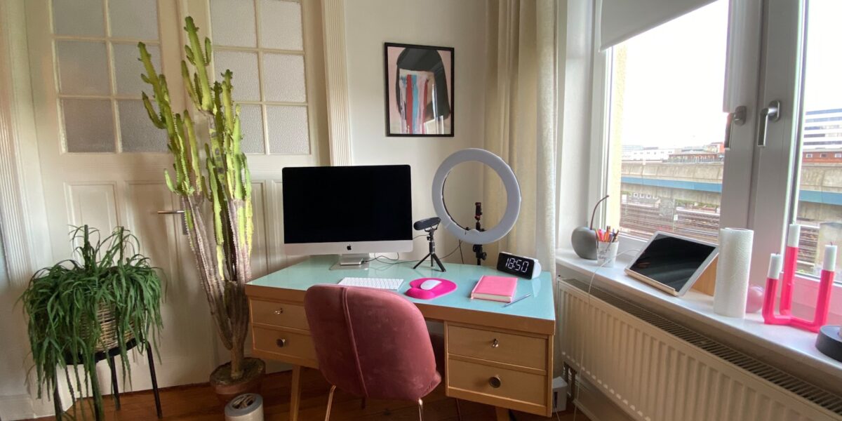 black flat screen computer monitor on brown wooden desk
