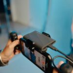 A man holding a cell phone in his hand