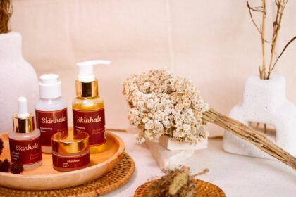 Skincare products are beautifully arranged for a display.